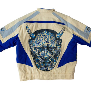 Beige and blue jacket with a dragon hannya design on a white background