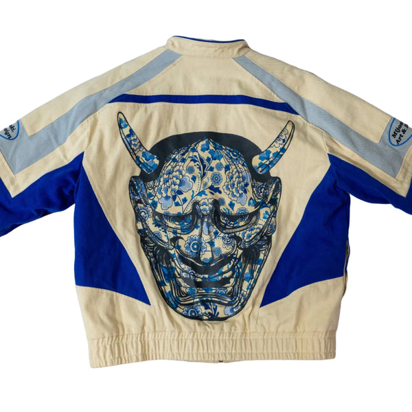 Beige and blue jacket with a dragon hannya design on a white background