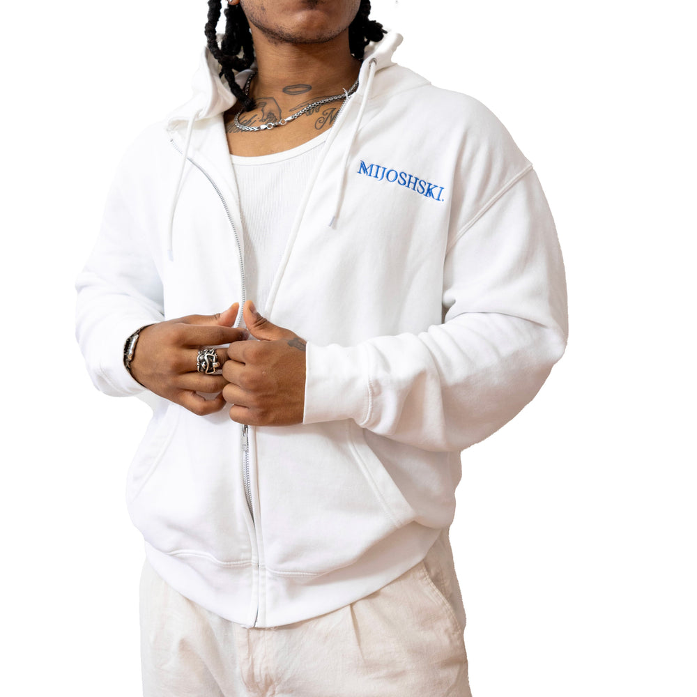 Person wearing a white hoodie with a blue Mijoshski logo on a white background